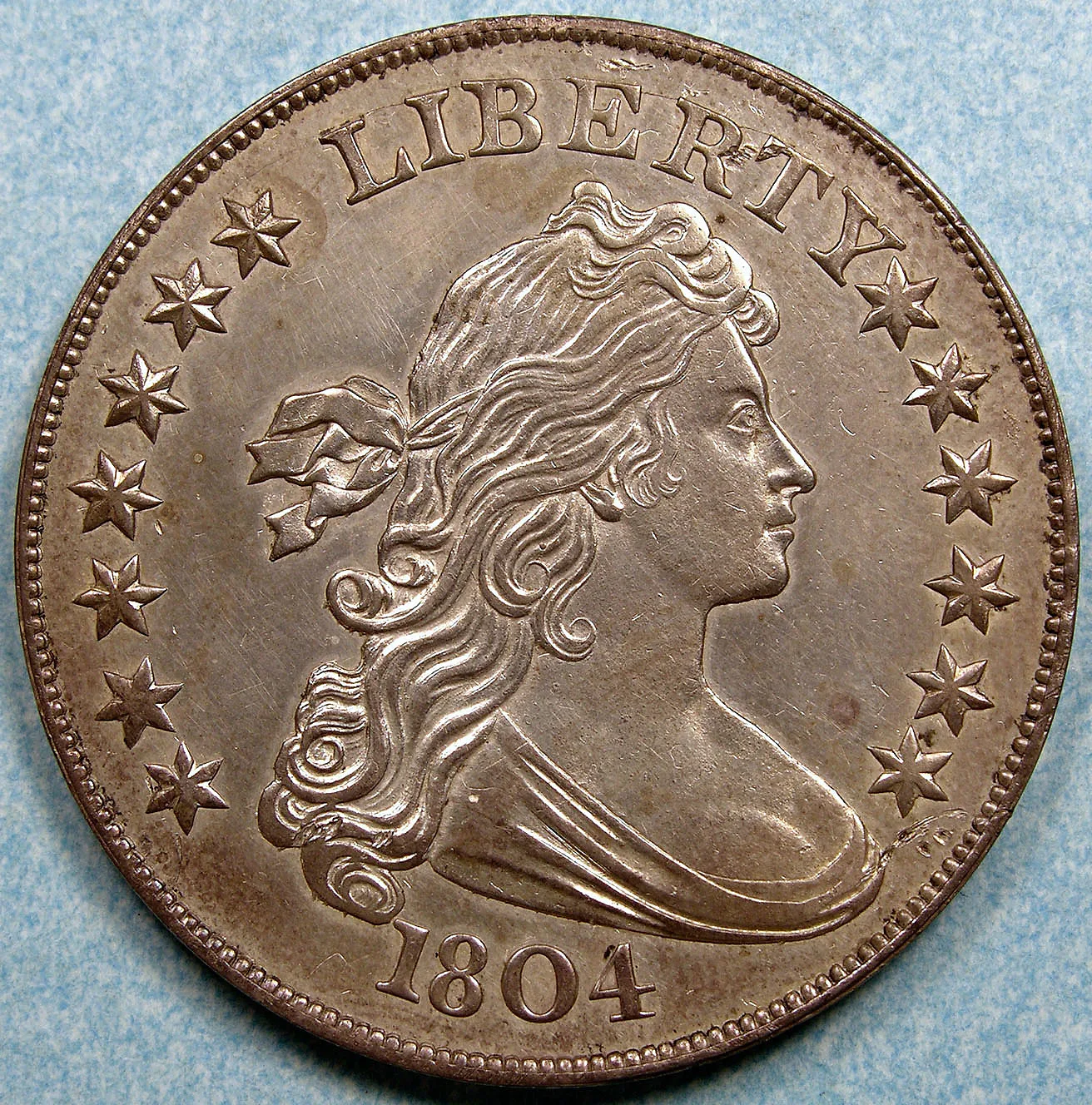 Obverse of a Class I 1804 Draped Bust silver dollar with draped Liberty bust and 1804 date