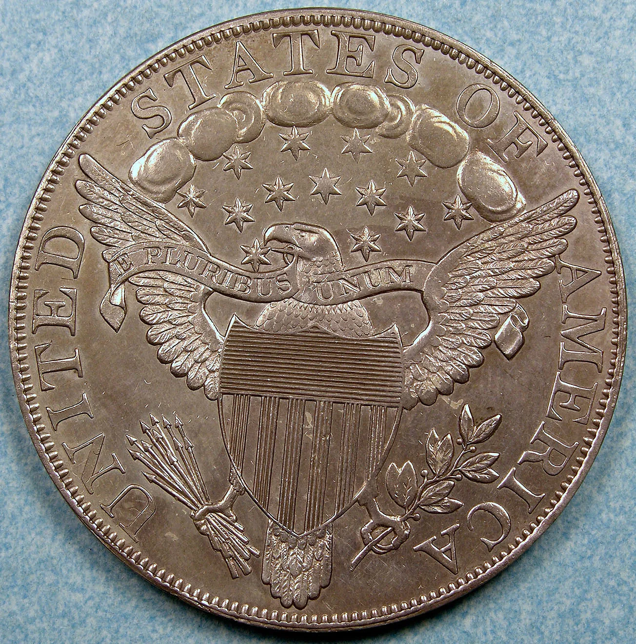 Reverse of a Class I 1804 Draped Bust silver dollar showing heraldic eagle and E Pluribus Unum scroll