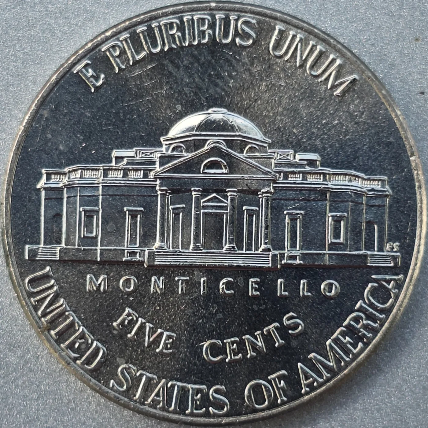 Reverse of a 2026 Jefferson nickel showing Monticello with the words Monticello, Five Cents and United States of America