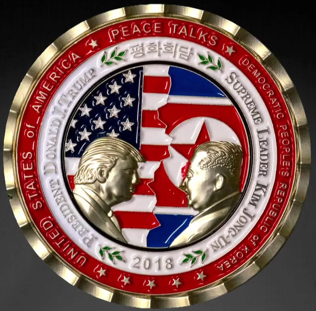 Enamelled commemorative medallion for the 2018 Trump and Kim Jong-un summit with both leaders in profile and the words PEACE TALKS