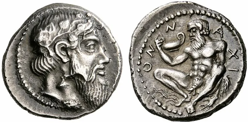 Obverse and reverse of a silver drachm of Naxos in Sicily, an ivy-wreathed head of Dionysos and a squatting bearded Silenos with Greek letters around him