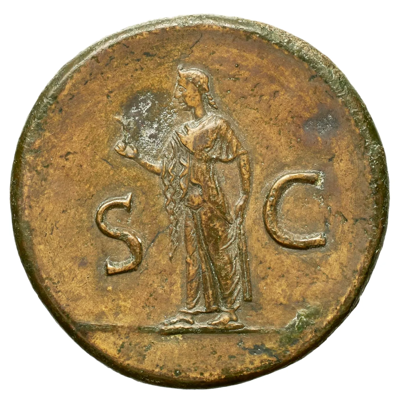 Reverse of a Roman brass sestertius, a helmeted draped figure standing between a large letter S and a large letter C