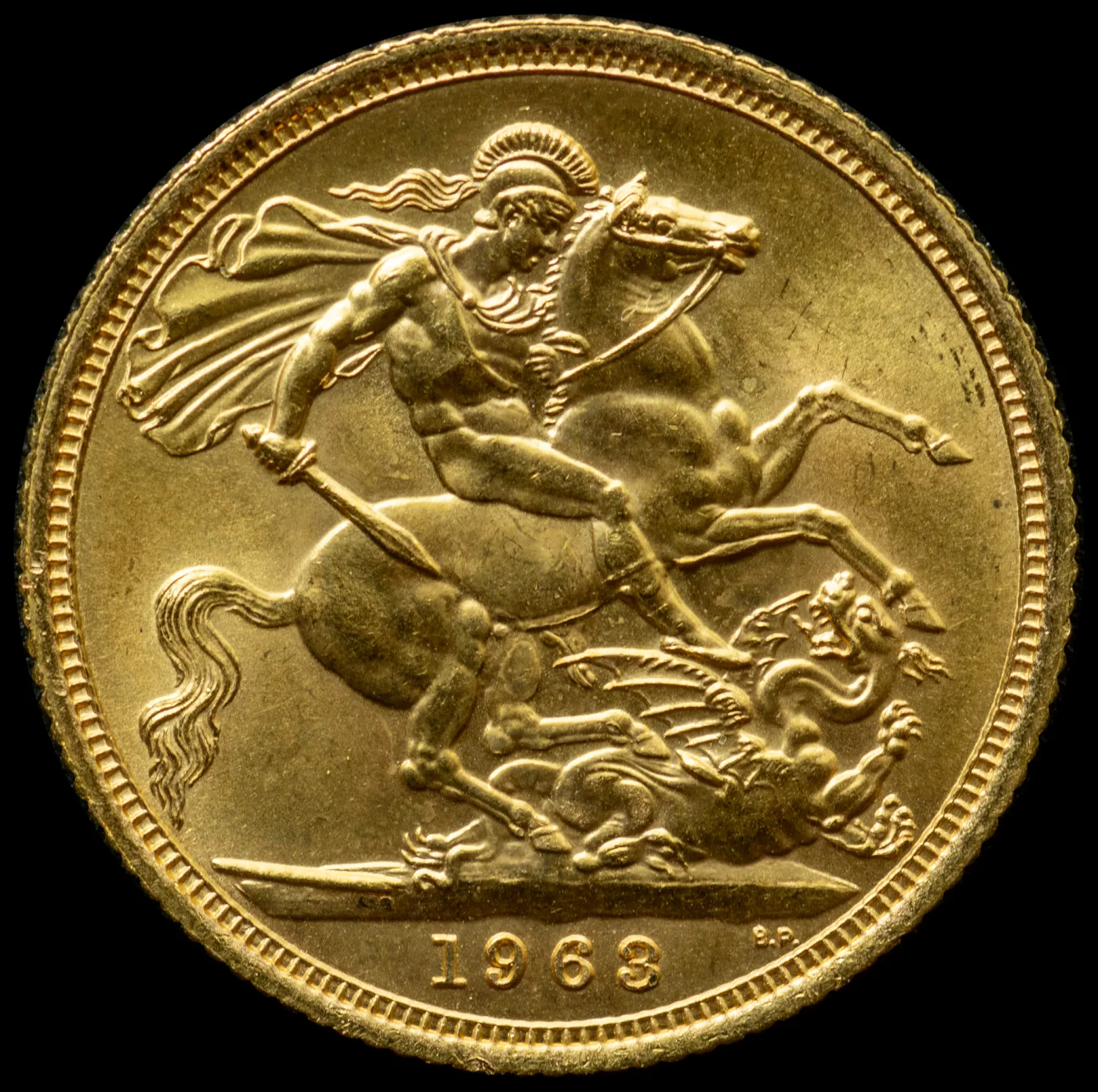 Reverse of a British gold sovereign, Saint George on horseback spearing a dragon, with the date 1963 in the exergue