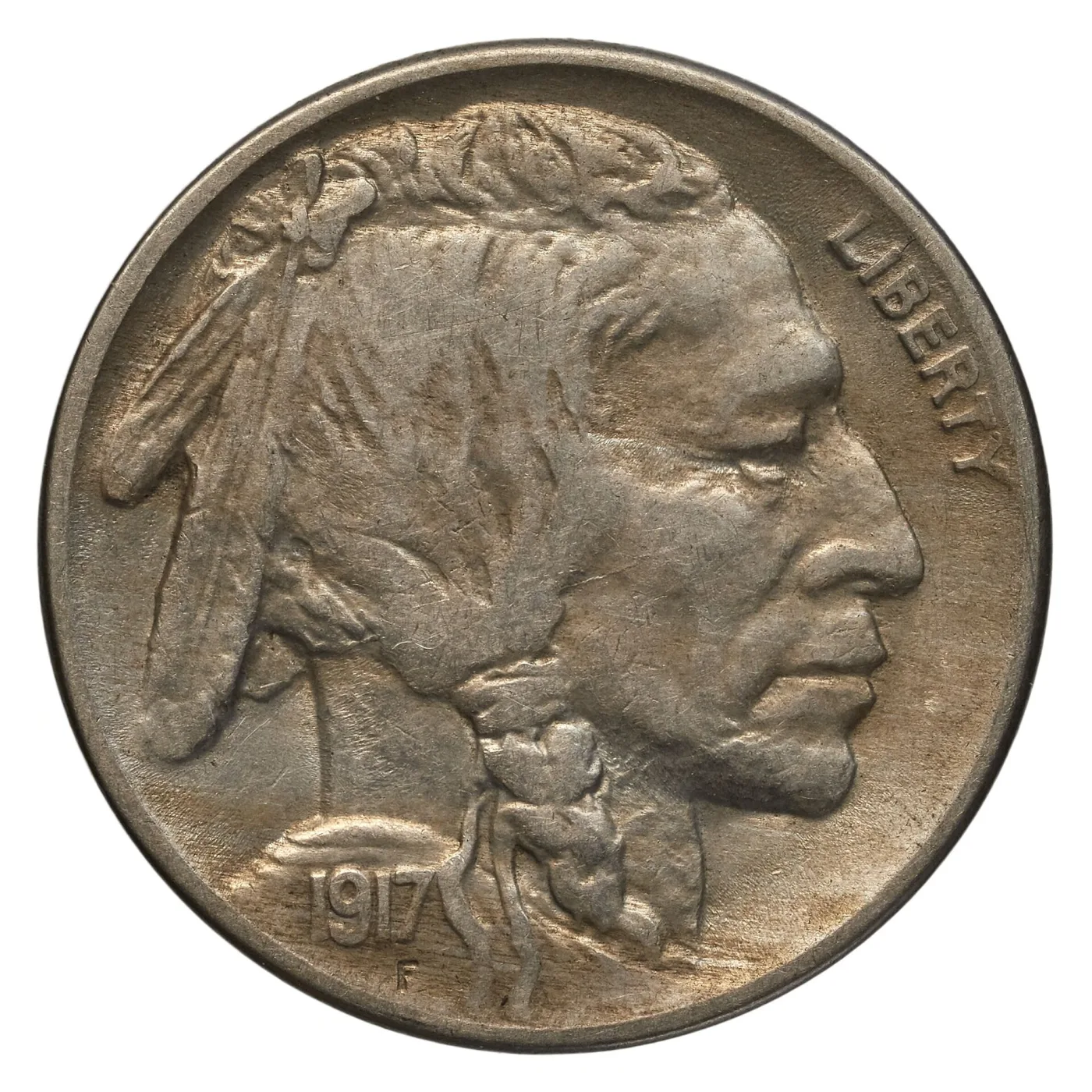 Obverse of a Buffalo nickel dated 1917, LIBERTY running down the right edge and the date on the shoulder truncation with a small F beneath it