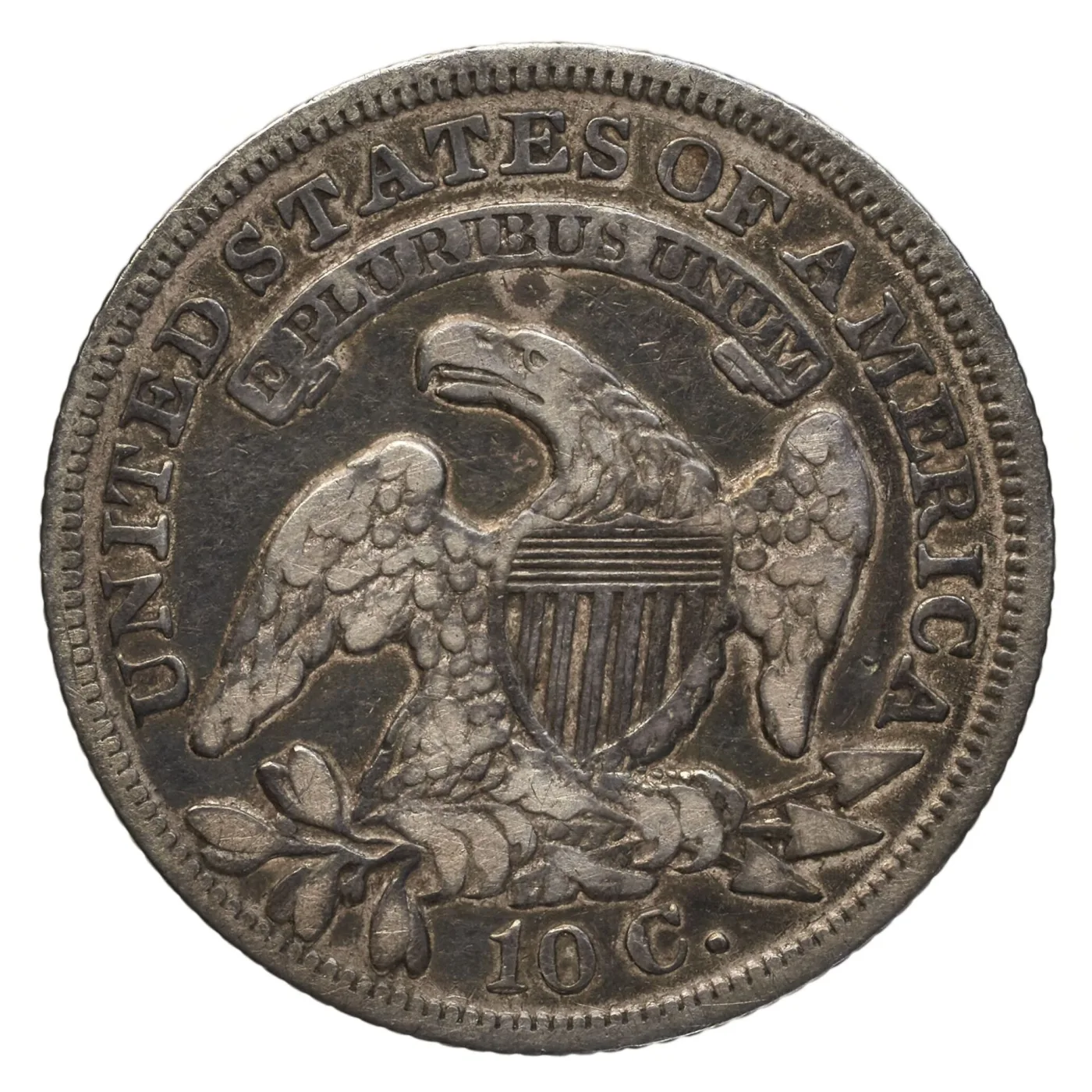 Reverse of an 1837 Capped Bust dime with no mint mark anywhere in the field around the eagle or below 10 C.