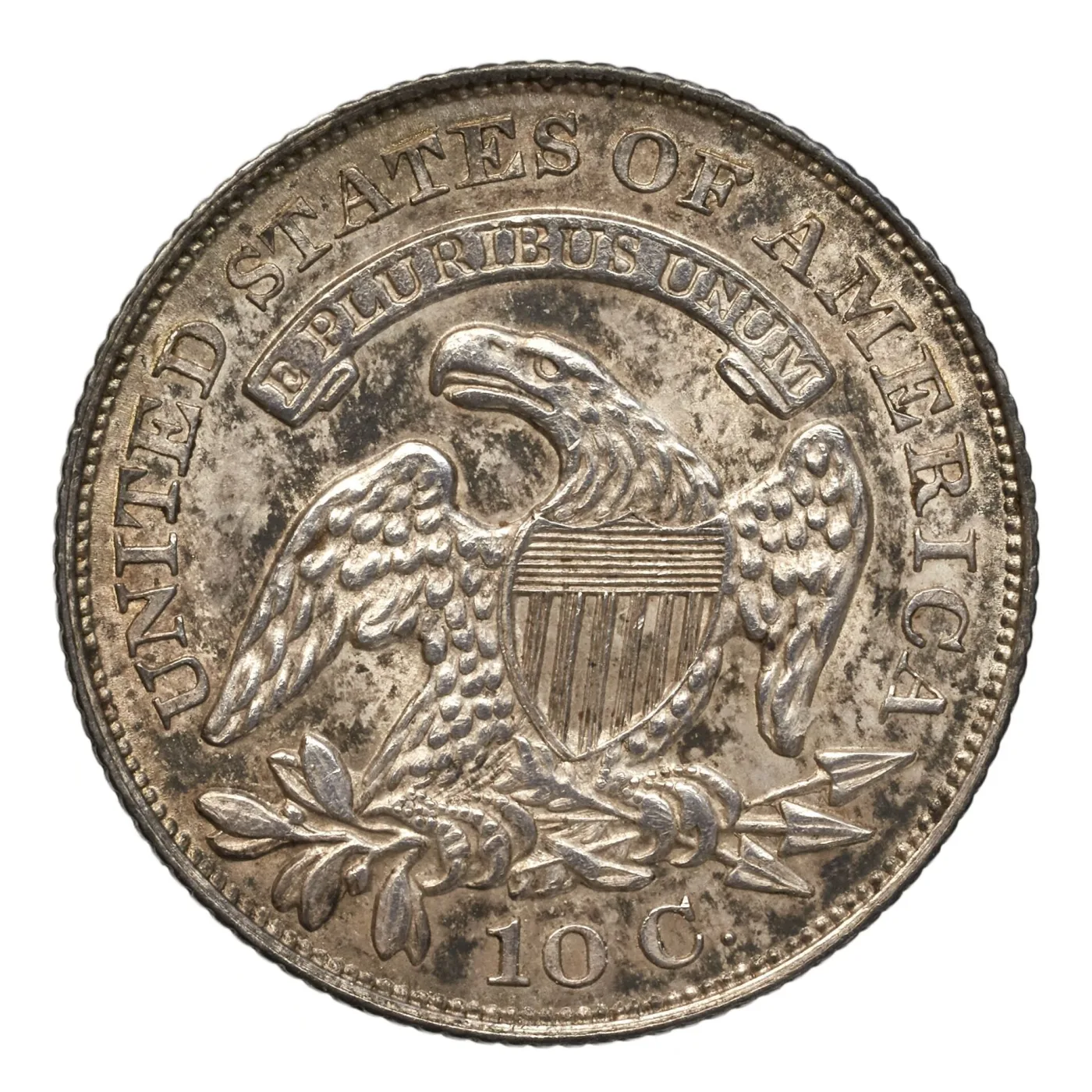 Reverse of an 1829 Small Size Capped Bust dime with 10 C. tucked close beneath the eagle's tail