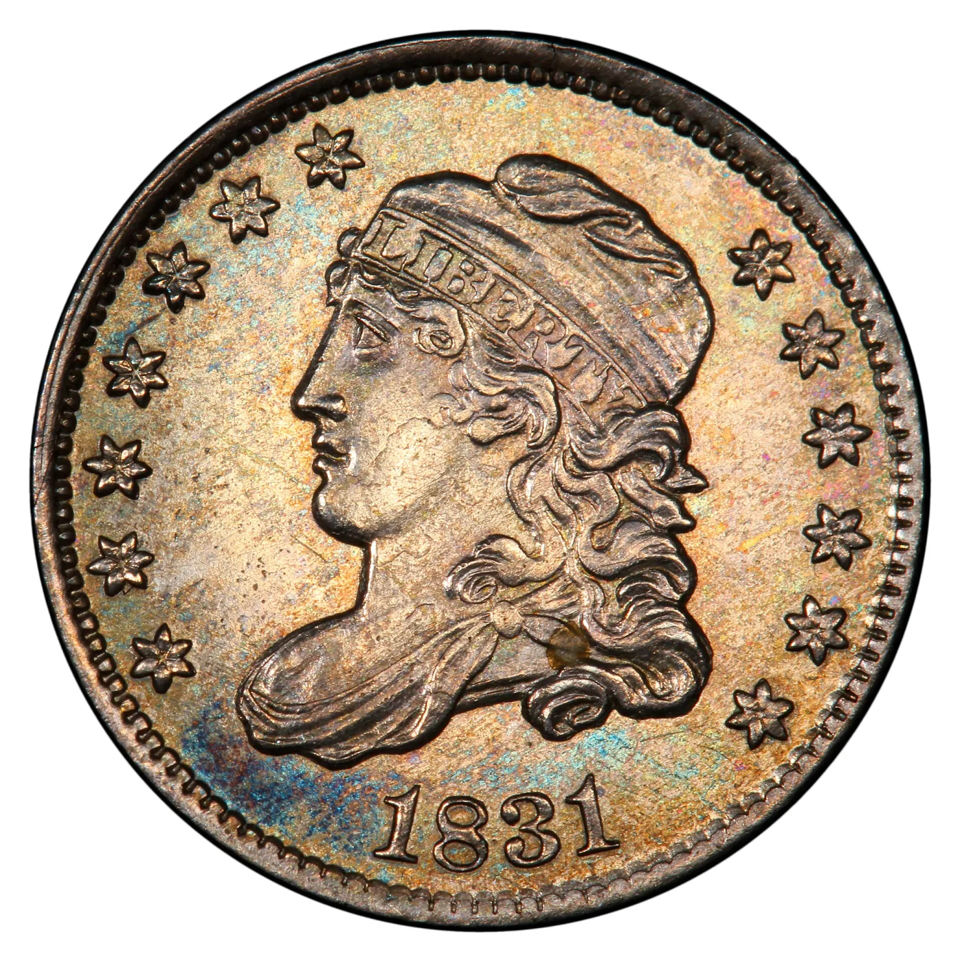 Obverse of an 1831 Capped Bust half dime enlarged, showing Liberty facing left in a cloth cap with LIBERTY on the band, thirteen stars and the date 1831 below the bust