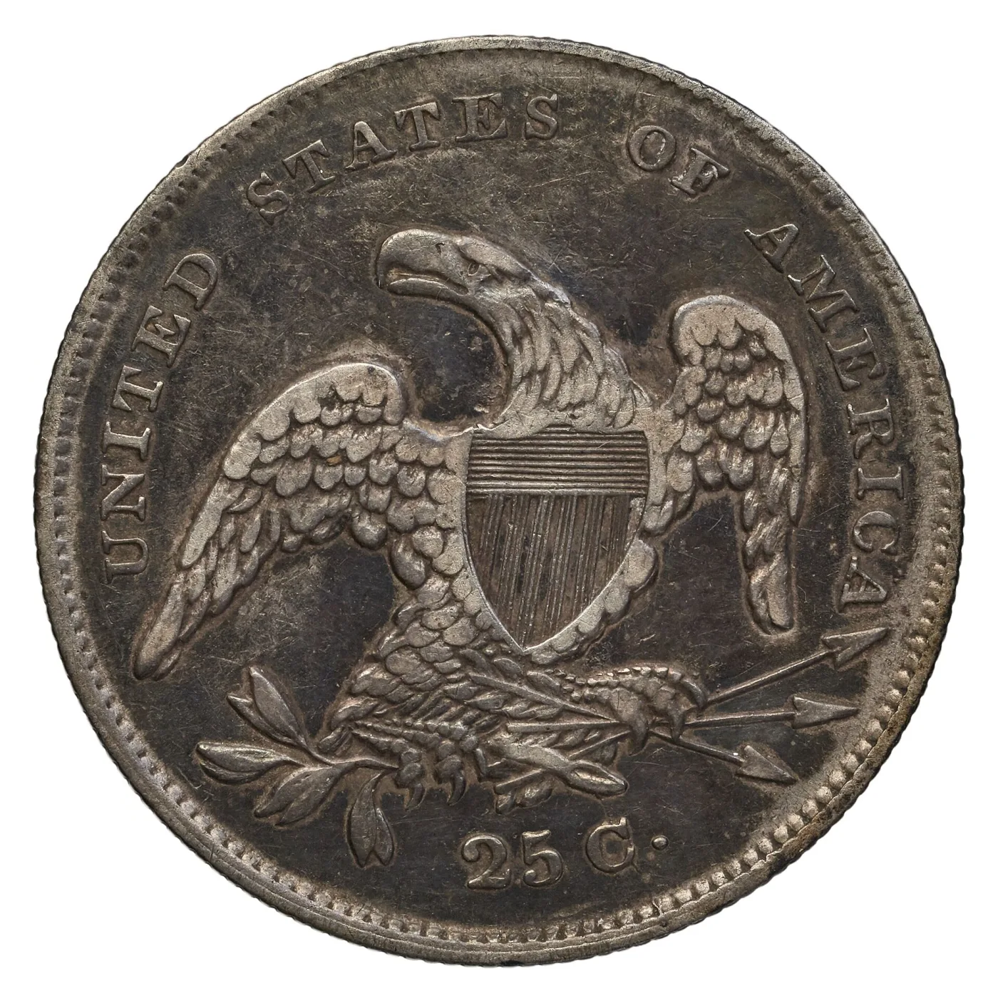 Reverse of an 1831 Capped Bust quarter with no scroll and no motto above the eagle, the field between the eagle's head and UNITED STATES OF AMERICA left empty