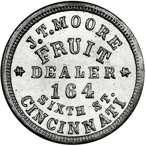 A silver-coloured Civil War store card reading J. T. MOORE, FRUIT DEALER, 164 SIXTH ST., CINCINNATI