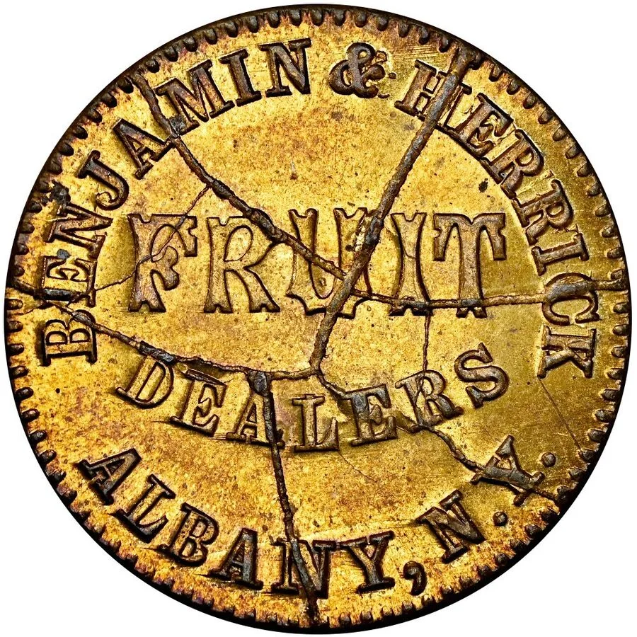 Civil War store card of Benjamin and Herrick, fruit dealers of Albany, New York, struck from a badly shattered die that leaves raised cracks across the whole face