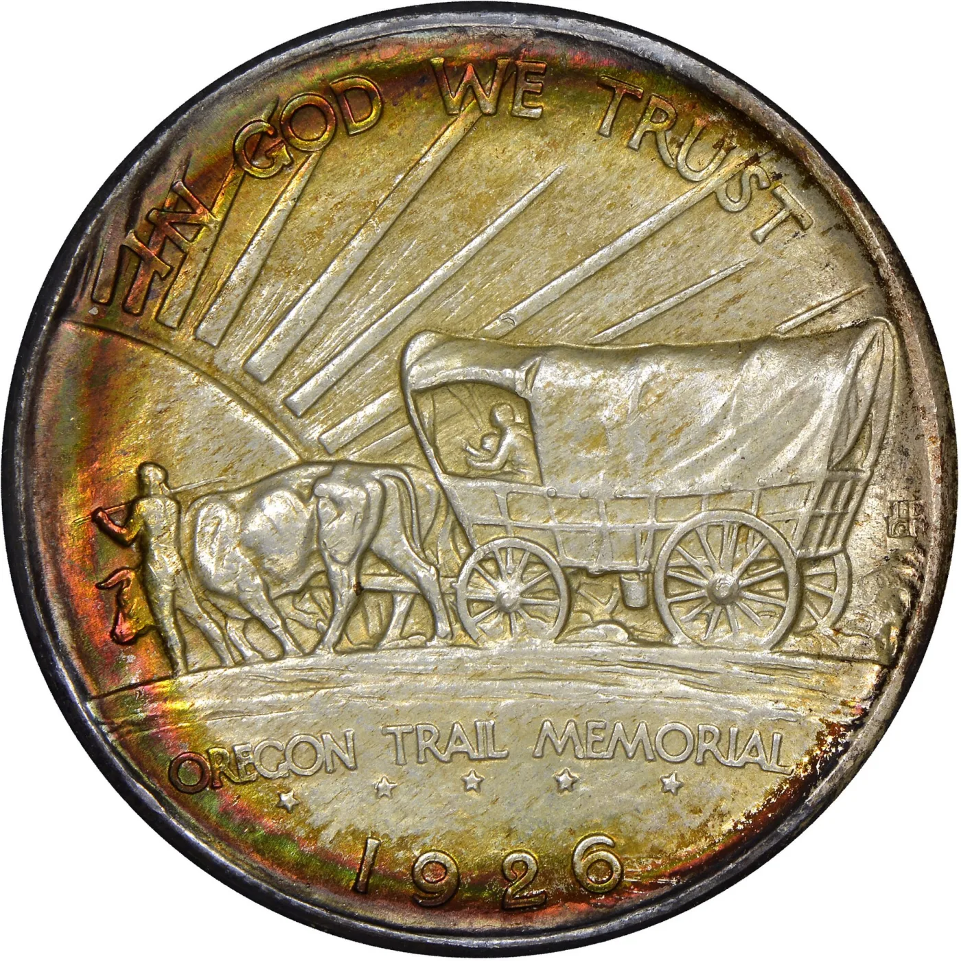 Reverse of a 1926 Oregon Trail Memorial half dollar showing a covered wagon drawn by oxen travelling left towards a setting sun, with OREGON TRAIL MEMORIAL and 1926 below