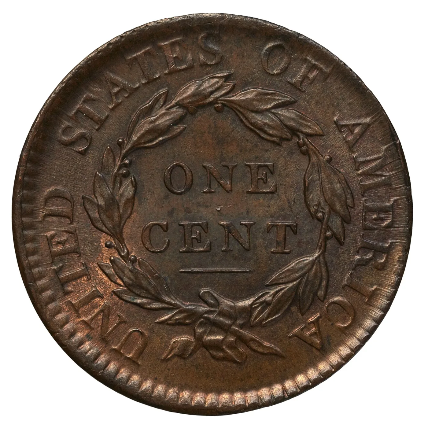 Reverse of an 1817 Coronet Head large cent showing ONE CENT inside a closed laurel wreath tied with a bow, UNITED STATES OF AMERICA around the rim, and an empty field beneath the bow