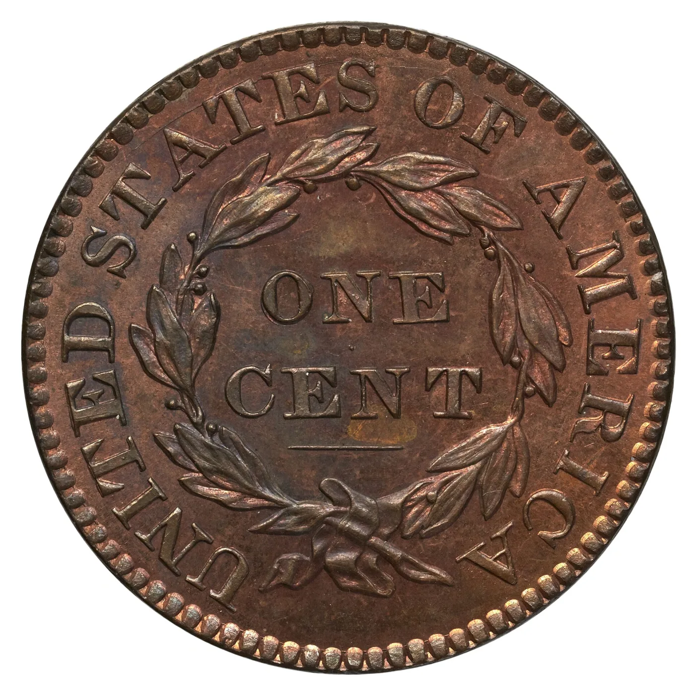 Reverse of an 1830 Coronet Head large cent in high grade showing ONE CENT inside a laurel wreath with UNITED STATES OF AMERICA around the border