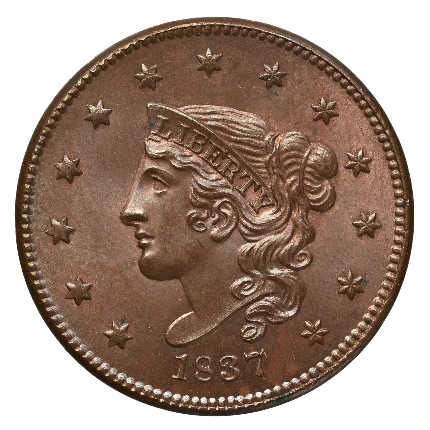 Obverse of an 1837 Coronet Head large cent in high grade, Liberty facing left with a longer leaner face and a pointed chin, a coronet lettered LIBERTY, thirteen stars around and the date 1837 below