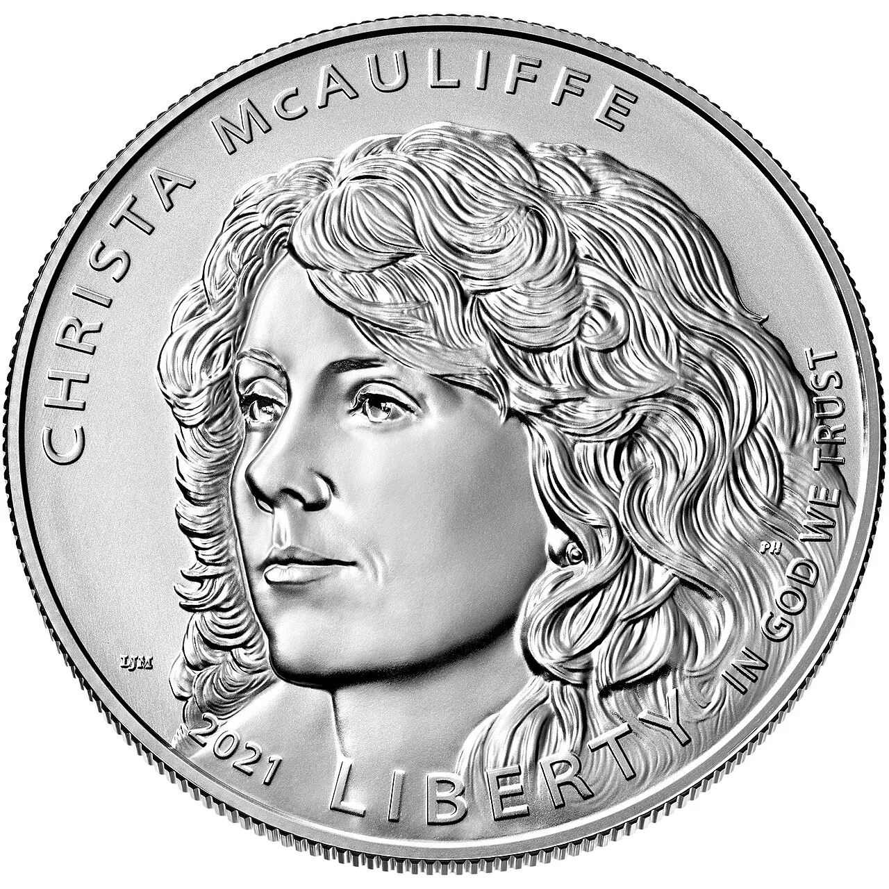 Obverse of the 2021 Christa McAuliffe silver dollar, a three-quarter portrait of McAuliffe with long wavy hair, her name above and 2021 LIBERTY below