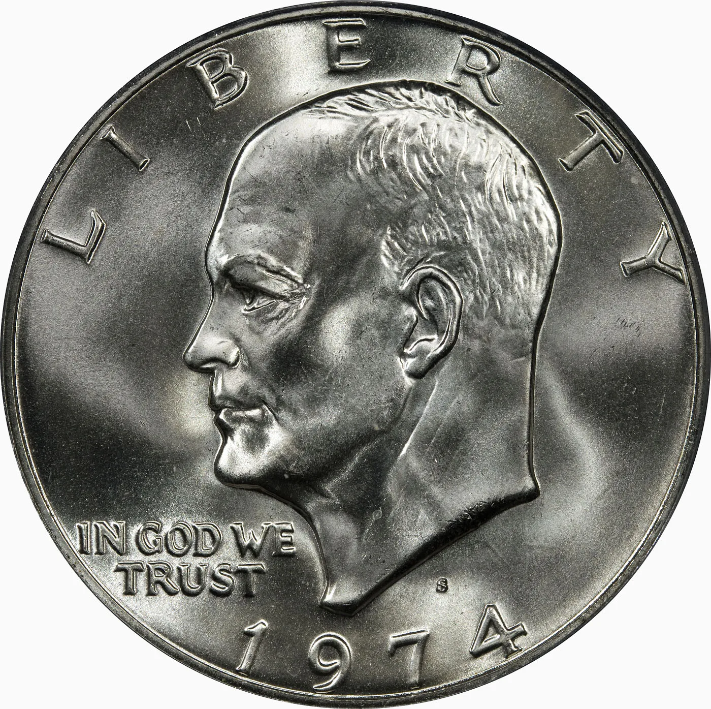 Obverse of a 1974-S Eisenhower dollar with LIBERTY above the portrait, IN GOD WE TRUST in two lines at the left, and a small S mint mark below the bust truncation