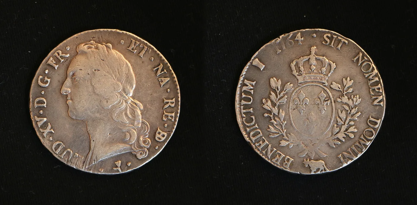 Silver ecu of Louis XV dated 1764, obverse with the king's bust and reverse with the crowned oval arms of France