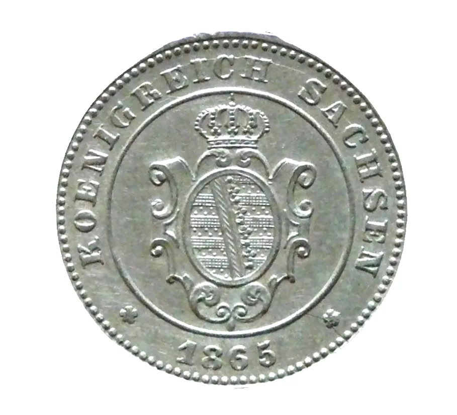 Arms side of an 1865 Saxon one neugroschen showing a crowned shield with the Saxon bars and rue crown, the legend KOENIGREICH SACHSEN and the date 1865