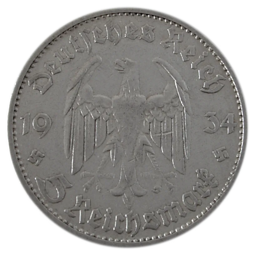 A 1934 German 5 Reichsmark showing a spread-winged eagle with the date split 19 34 across the field, two small swastikas low on either side, and DEUTSCHES REICH in Fraktur above