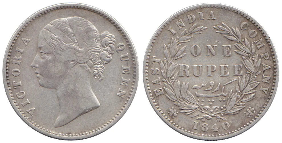 East India Company one rupee of 1840, obverse with the young head of Victoria and reverse reading EAST INDIA COMPANY ONE RUPEE within a wreath