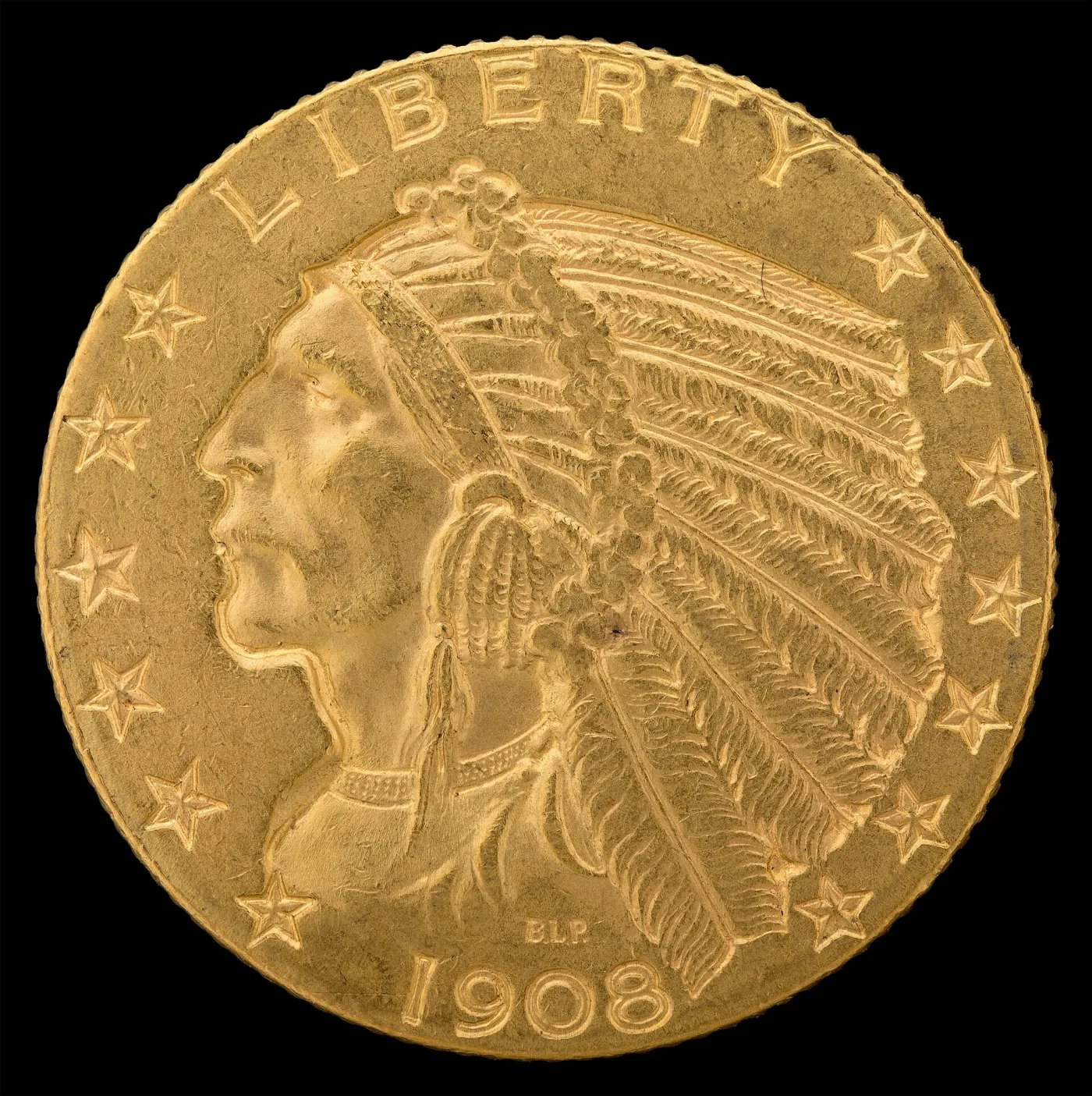 Large view of the obverse of a 1908 Indian Head half eagle, the chief's portrait, thirteen stars, LIBERTY and the date all sunk below a flat field that runs to the edge without a raised rim