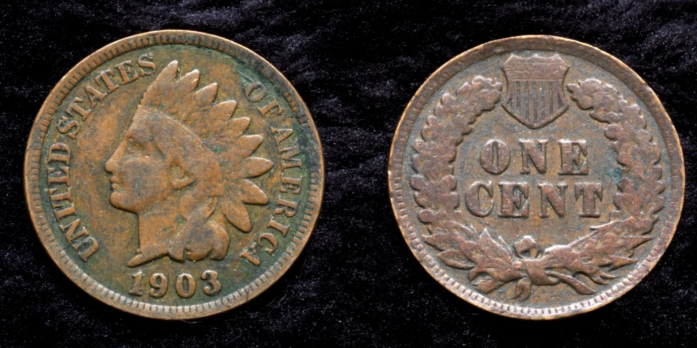 Obverse and reverse of a heavily circulated 1903 Indian Head cent, the headband worn smooth with no readable letters while the date remains bold