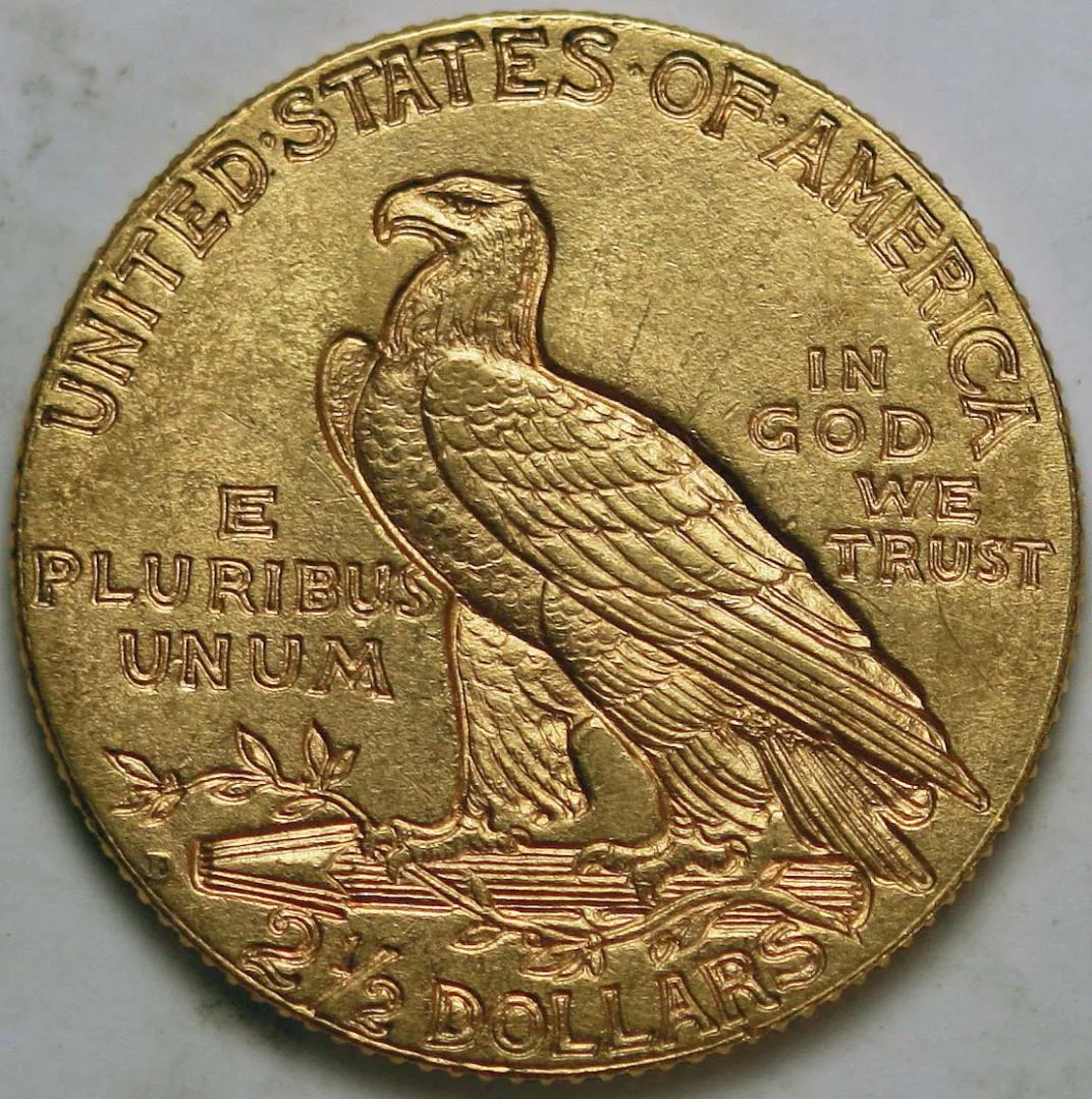 Reverse of the same 1911 Indian Head quarter eagle, with a small incuse D at the rim to the left of the arrow bundle, above the 2 of 2 and a half DOLLARS