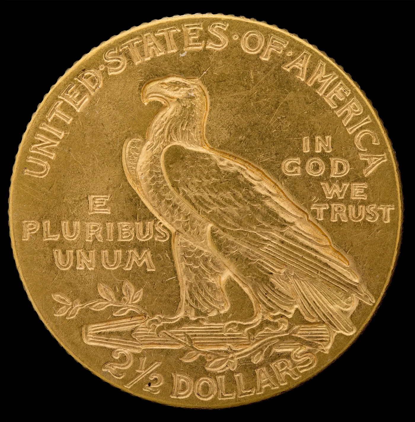 Reverse of a 1908 Indian Head quarter eagle showing an incuse standing eagle on a bundle of arrows, UNITED STATES OF AMERICA above, E PLURIBUS UNUM at left, IN GOD WE TRUST at right and 2 and a half DOLLARS below
