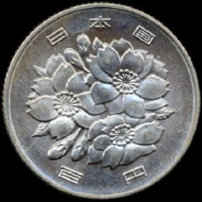 Cherry-blossom face of the same Japanese 100 yen coin with no date on it