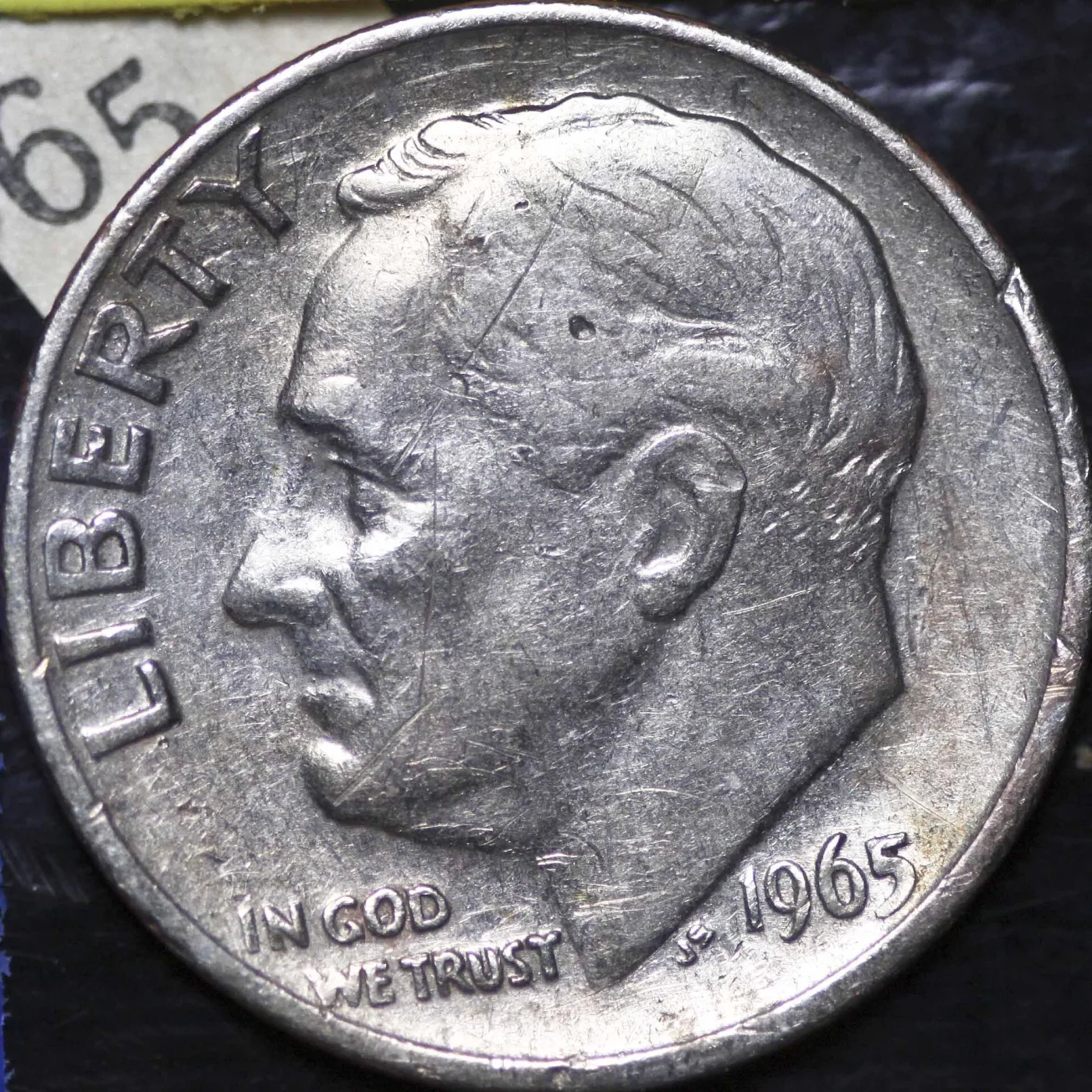 Obverse of a 1965 Roosevelt dime, the first year the denomination was struck in copper-nickel clad instead of 90% silver