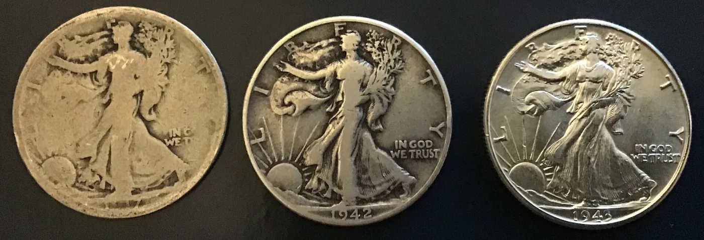 Three Walking Liberty half dollars side by side, from a dateless heavily worn example through a 1942 in Fine to a bright nearly uncirculated 1943