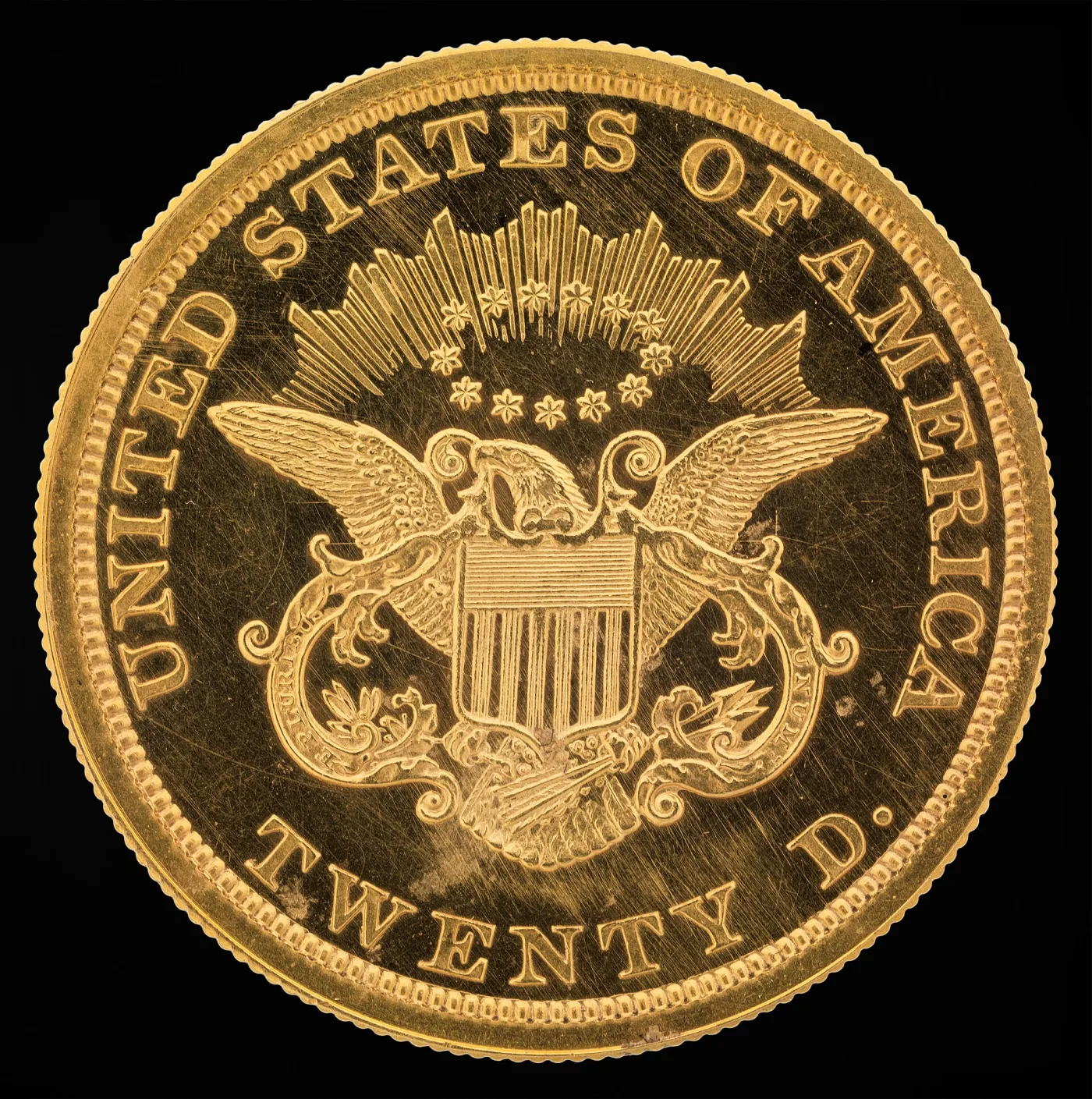 Type 1 Liberty Head double eagle reverse showing an open field of rays and stars above the eagle with no motto and the denomination TWENTY D. at the bottom