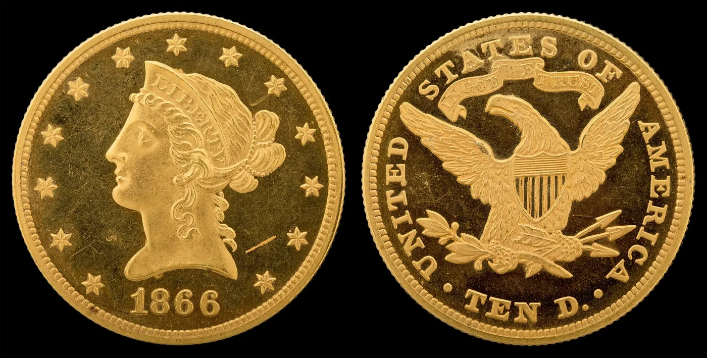 Obverse and reverse of an 1866 Liberty Head Eagle proof, the reverse with the IN GOD WE TRUST scroll above the eagle