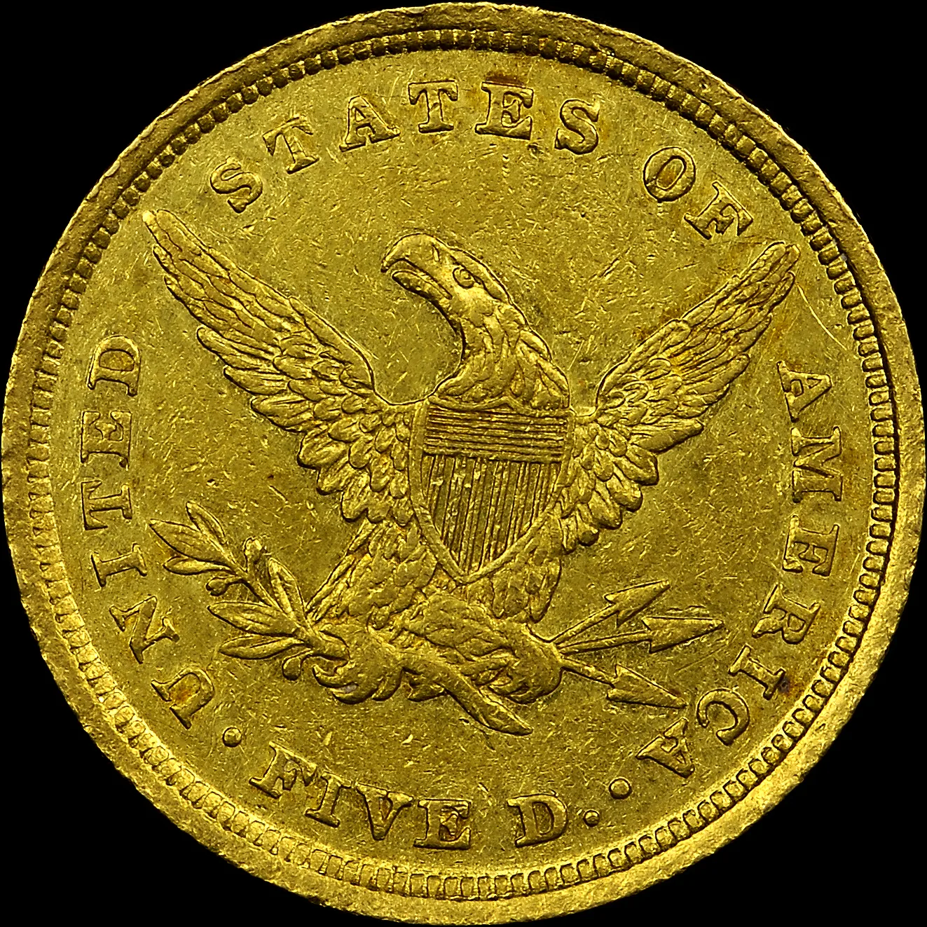 Reverse of an 1839-C Liberty Head Half Eagle showing the heraldic eagle with a Union shield, an open field above the eagle's head, and the denomination FIVE D. at the bottom