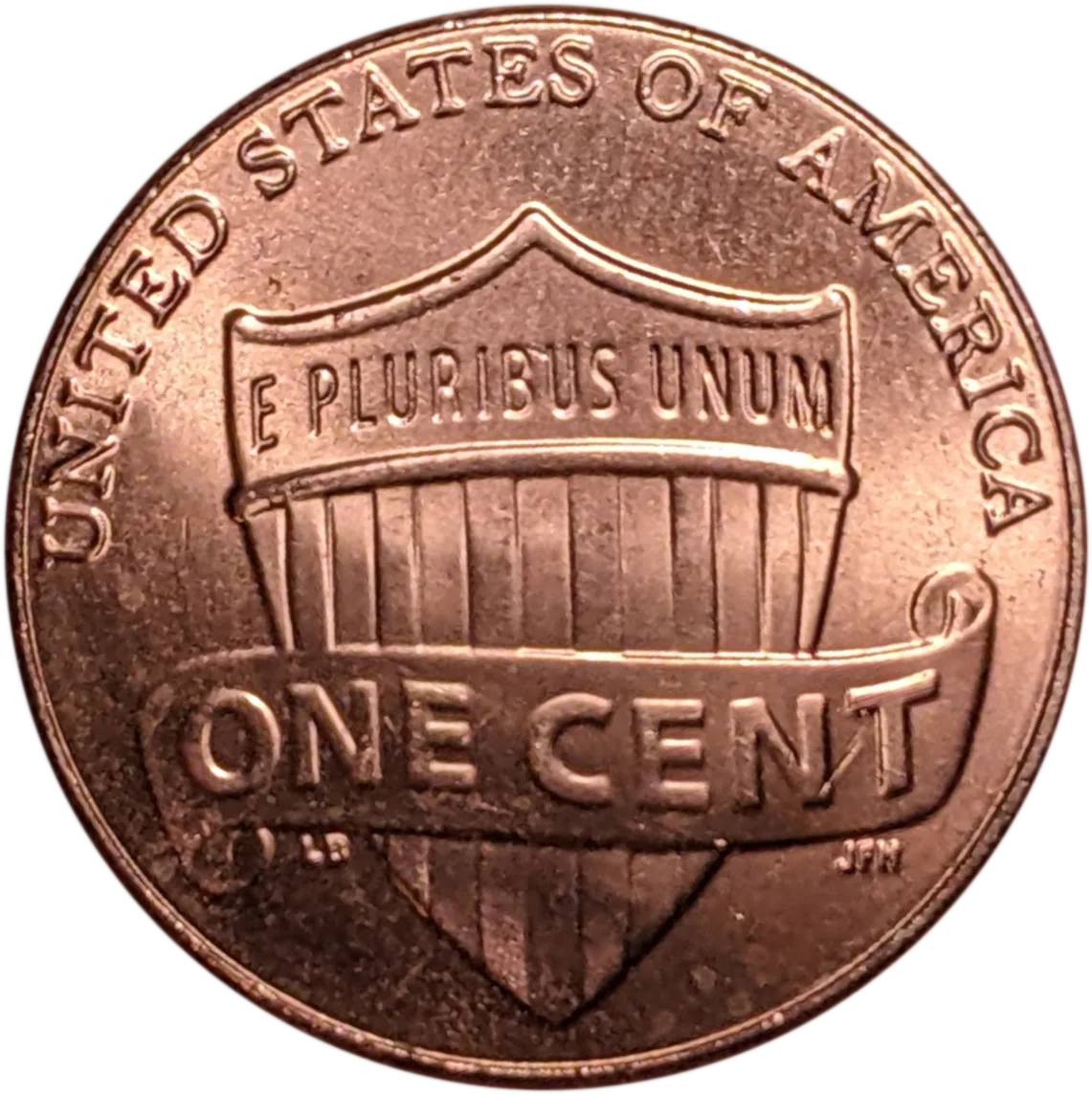 Reverse of a Lincoln Shield cent, a Union shield with thirteen vertical stripes, E PLURIBUS UNUM on the band across the top and ONE CENT on a scroll over the stripes