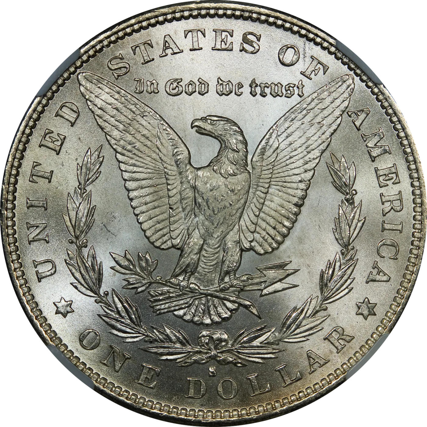 Reverse of an 1879-S Morgan silver dollar showing the eagle within a wreath and a small S below the wreath bow