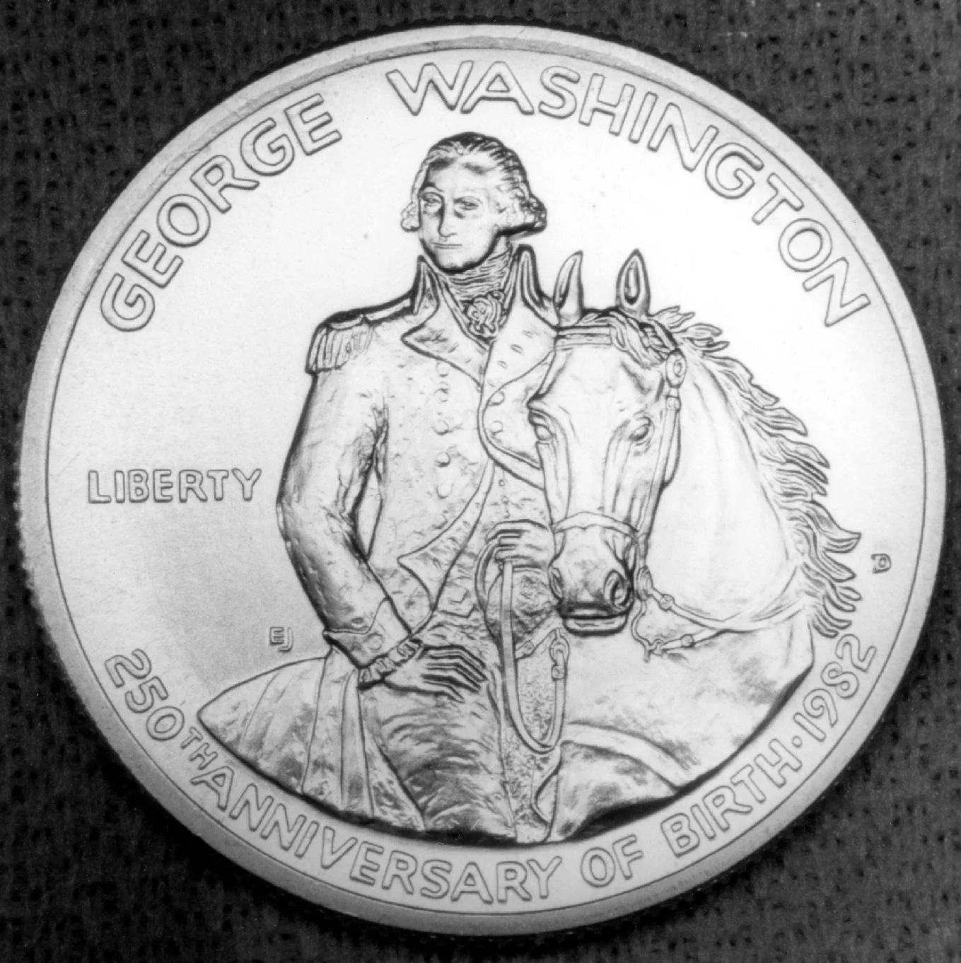 Obverse of a 1982 George Washington commemorative half dollar showing Washington on horseback