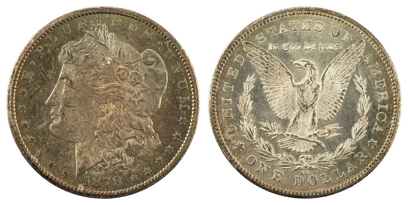 Obverse and reverse of an 1878-CC Morgan dollar side by side, Liberty facing left on the left and an eagle within a wreath on the right