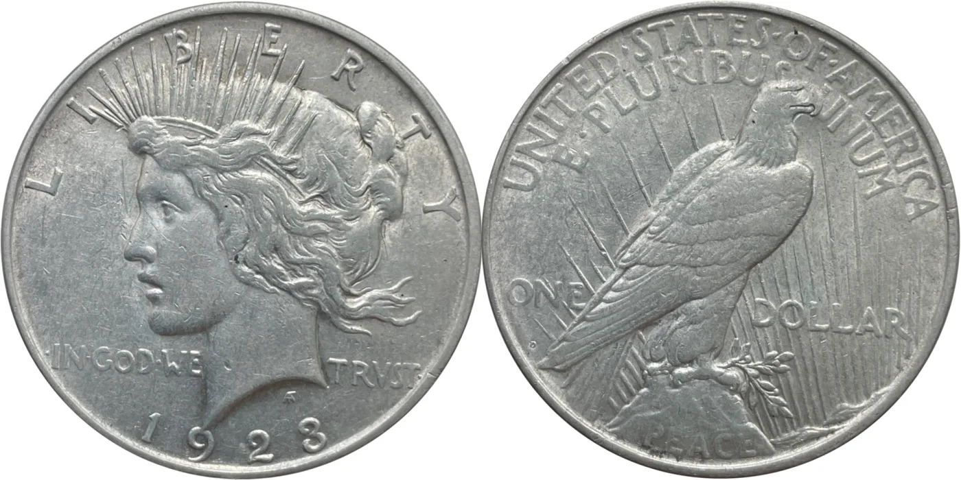 Obverse and reverse of a 1923-D Peace dollar struck in low relief, the crown rays flatter and the eagle's feathers shallower than on the 1921