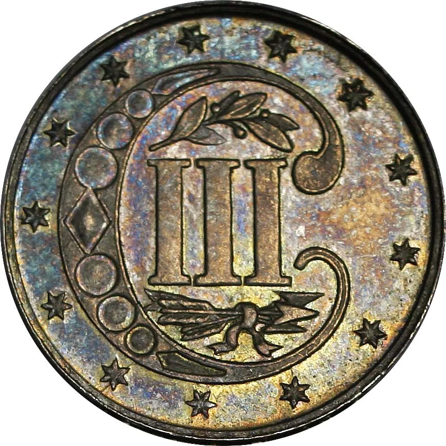 Reverse of an 1871 proof three-cent silver piece, the Roman numeral III inside an ornamented C surrounded by stars, the whole surface covered in blue, gold and violet toning