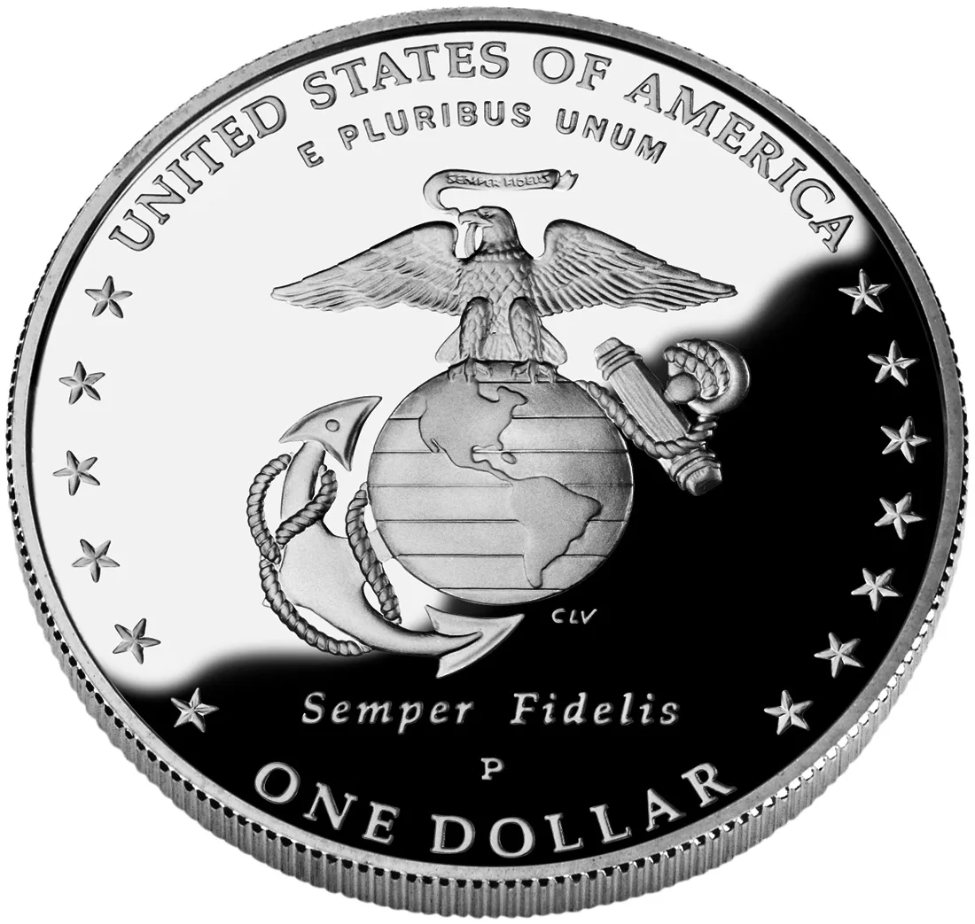 Reverse of a proof Marine Corps commemorative silver dollar, the frosted eagle-globe-and-anchor emblem raised against a field that reflects black on the right