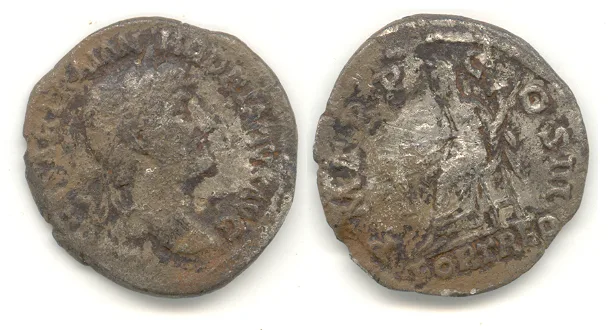 Worn silver denarius of Hadrian with the legend IMP CAESAR TRAIAN HADRIANVS AVG around the laureate bust, and a standing figure on the reverse