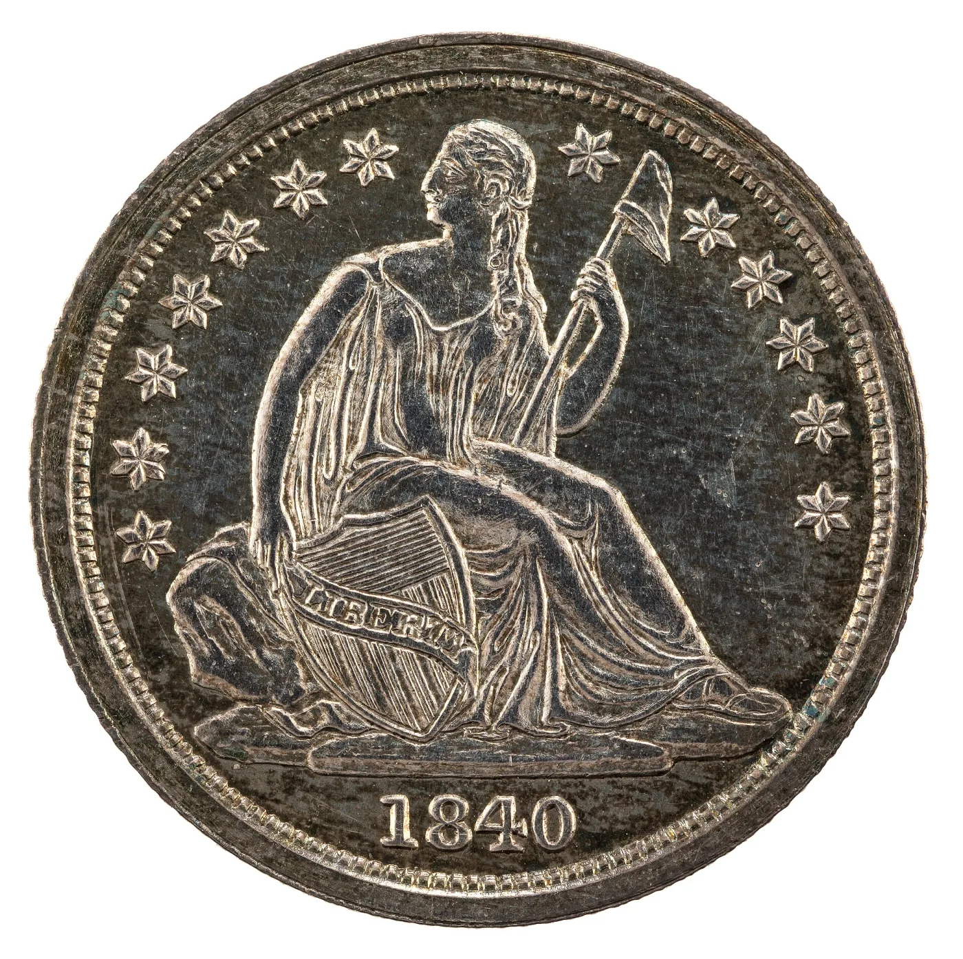 Obverse of an 1840 Seated Liberty dime with thirteen six-pointed stars around Liberty and no drapery fold below the elbow of the arm resting on the shield