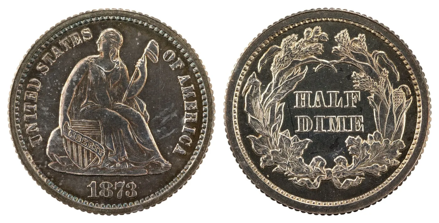 Obverse and reverse of an 1873 Seated Liberty half dime, the obverse carrying UNITED STATES OF AMERICA around Liberty instead of stars and the reverse HALF DIME inside a large cereal wreath