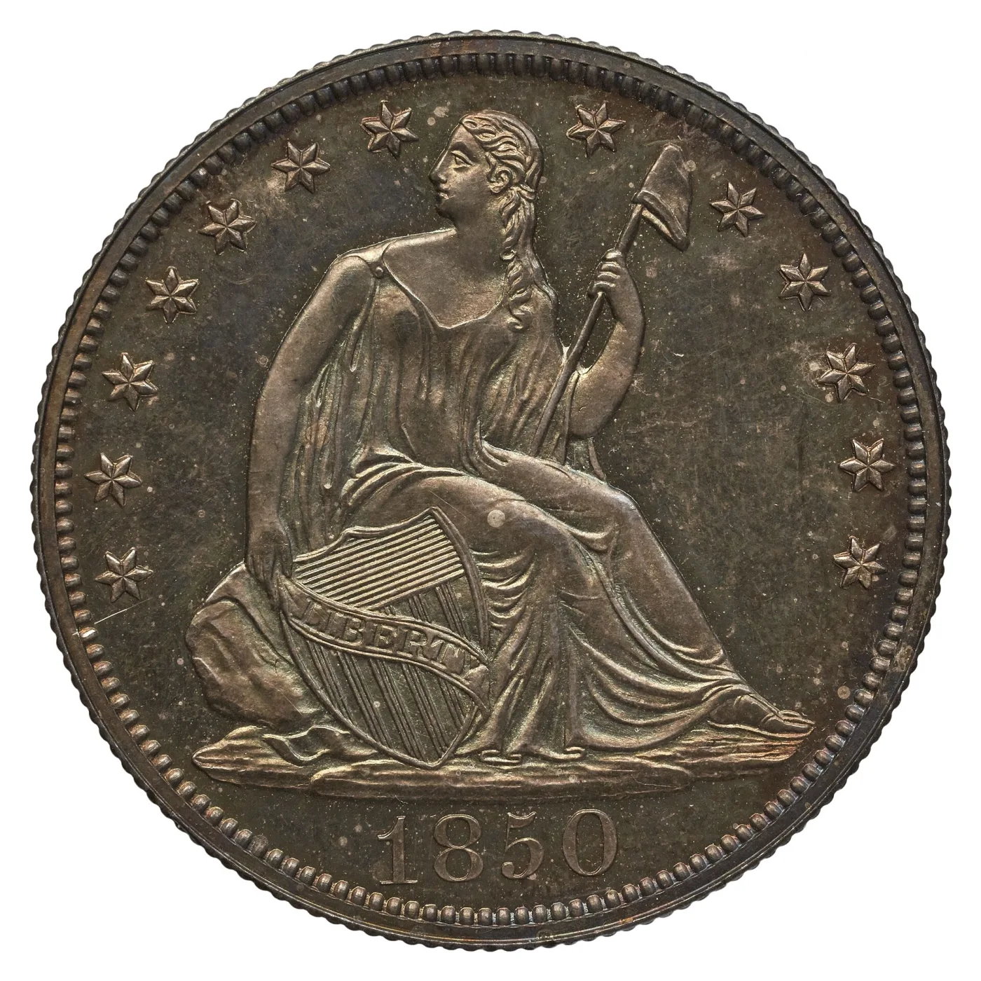 Obverse of an 1850 Seated Liberty half dollar showing Liberty seated on a rock with a shield and a liberty cap on a pole, thirteen stars around the rim and the date 1850 below