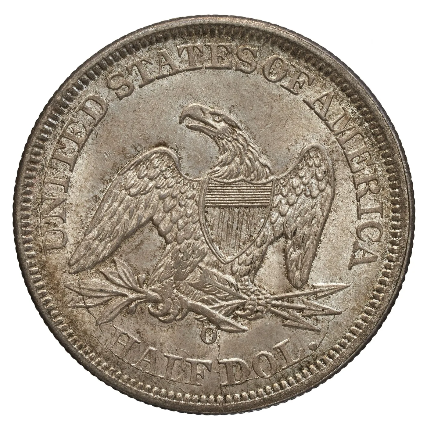 Reverse of an 1854 New Orleans Seated Liberty half dollar with a plain field around the eagle, showing that the rays of 1853 had already been removed, and an O mint mark below the claws