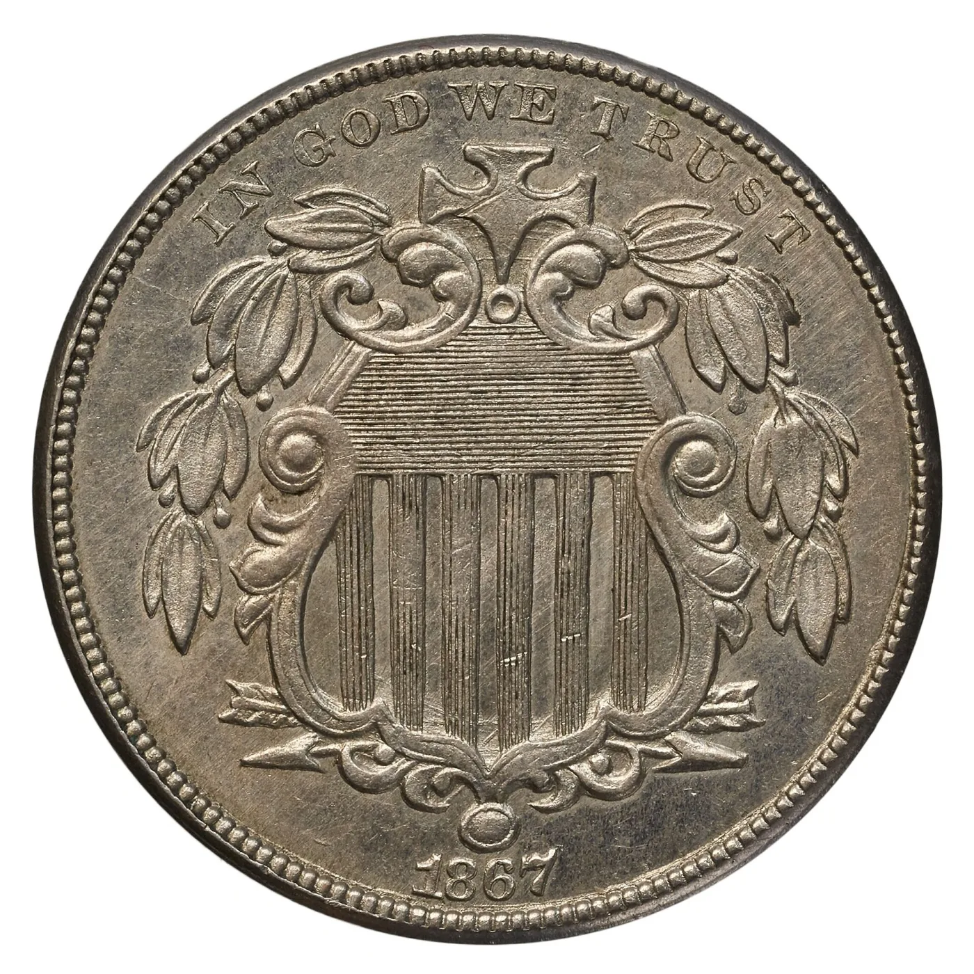 Obverse of an 1867 Shield nickel, identical in design to the 1866 apart from the final digit of the date