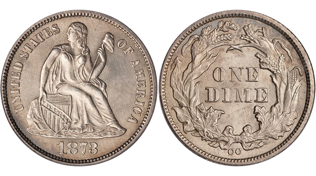 The same 1873 dime photographed again from a slightly different angle, both faces visible