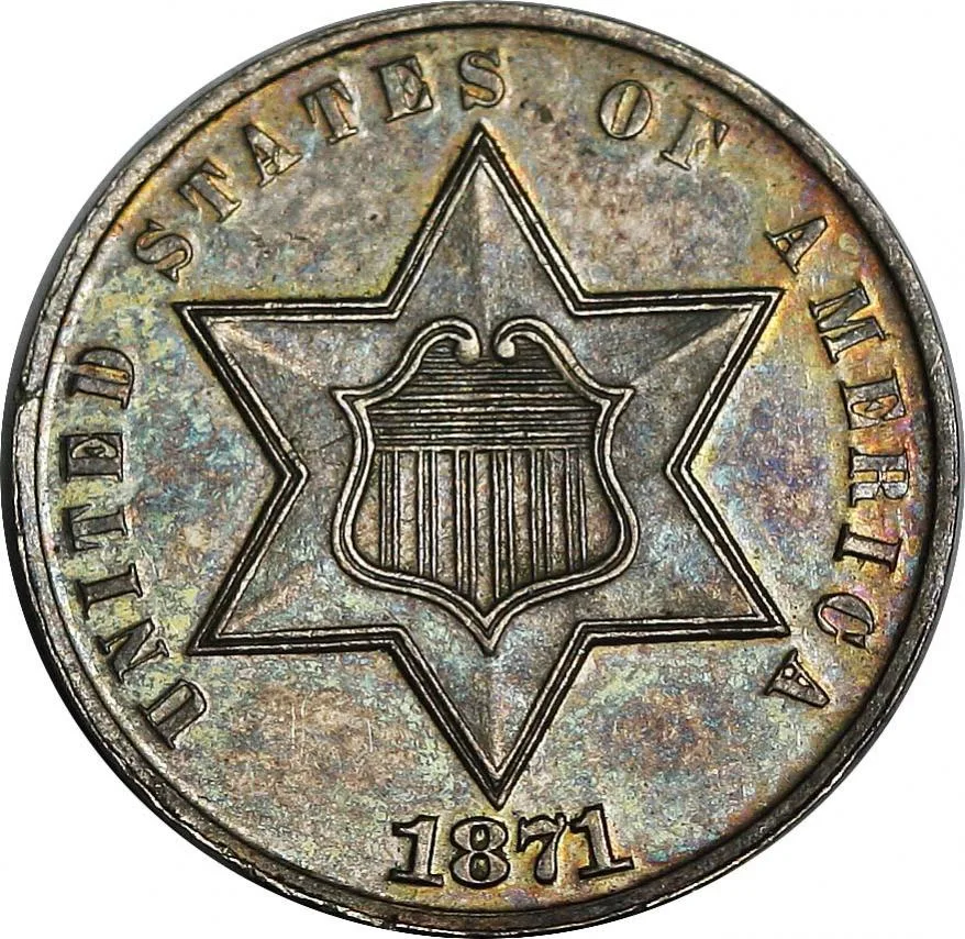 Obverse of an 1871 proof silver trime showing the six-pointed star with a federal shield at its centre