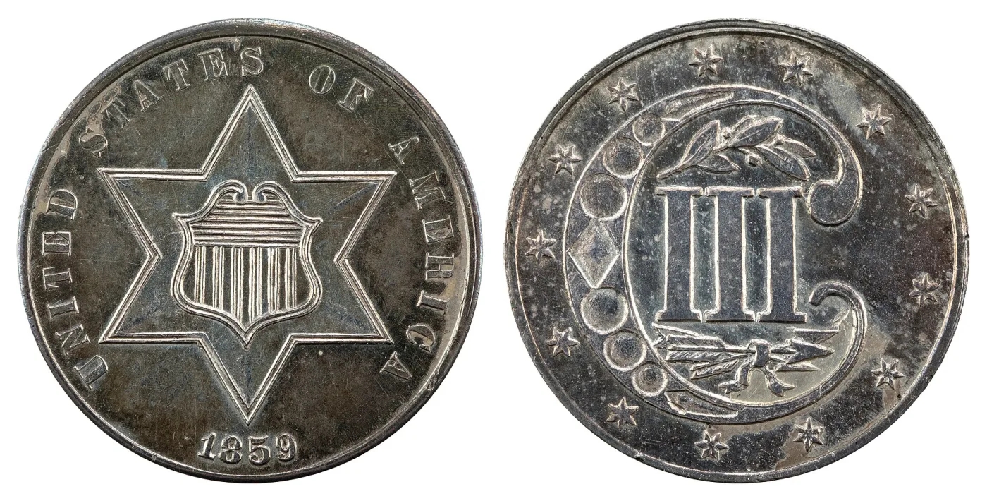 Obverse and reverse of an 1859 Type 3 silver trime, with two lines outlining the star and the sprig and arrows retained on the reverse